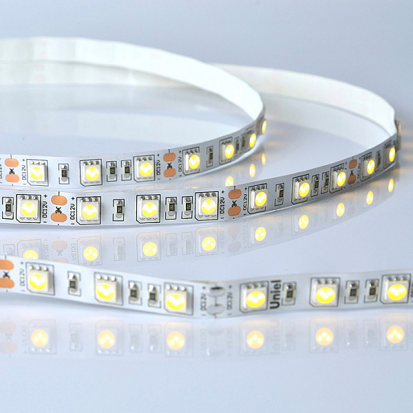 Светодиодная лента Uniel ULS-M25-5050-60LED/m-10mm-IP20-DC12V-14,4W/m-5M-3000K PROFI катушка в герметичной упаковке