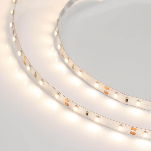 Светодиодная лента Arlight 4,8W/m 60LED/m 3528SMD теплый белый 5M 010597(B) Светодиодная лента Arlight 4,8W/m 60LED/m 3528SMD теплый белый 5M 010597(B)